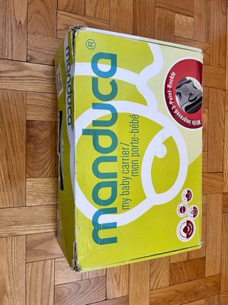 Mochila Manduca portabebé. 