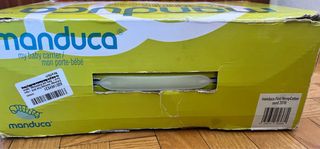Mochila Manduca portabebé. 
