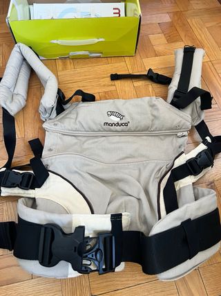 Mochila Manduca portabebé. 