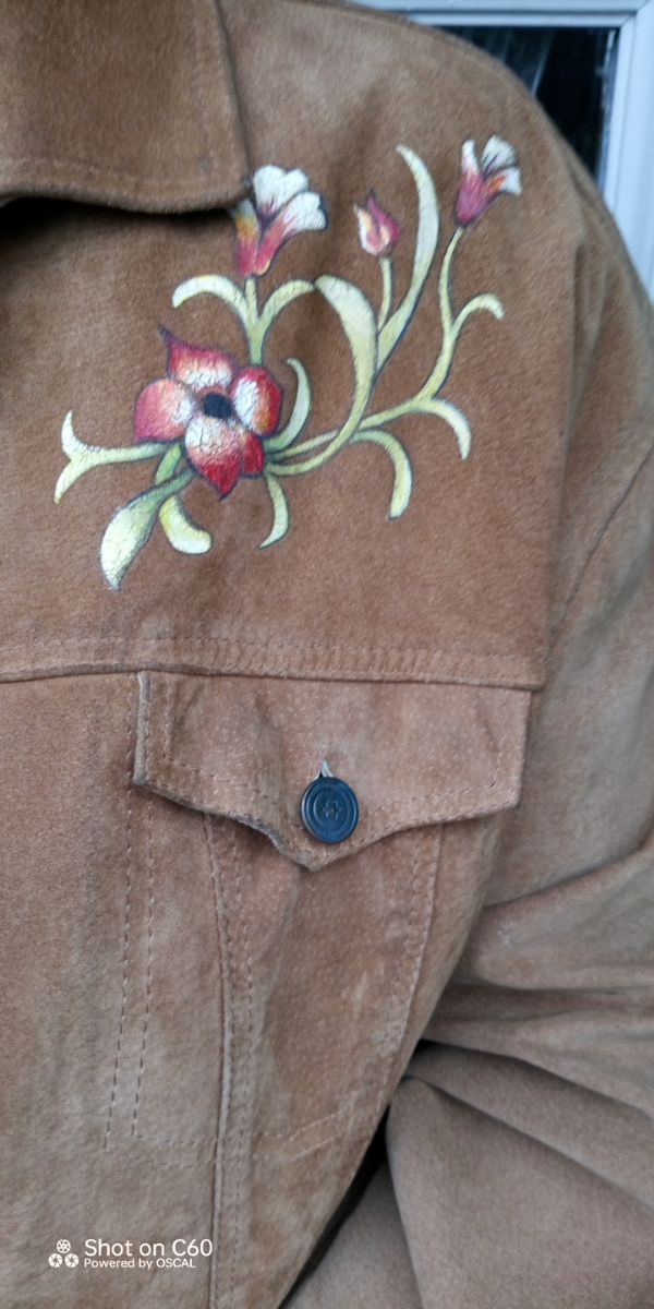 Giubbetto pelle con decorazioni