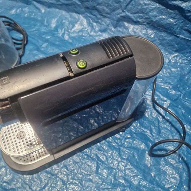 Cafetera espresso cápsulas averiada