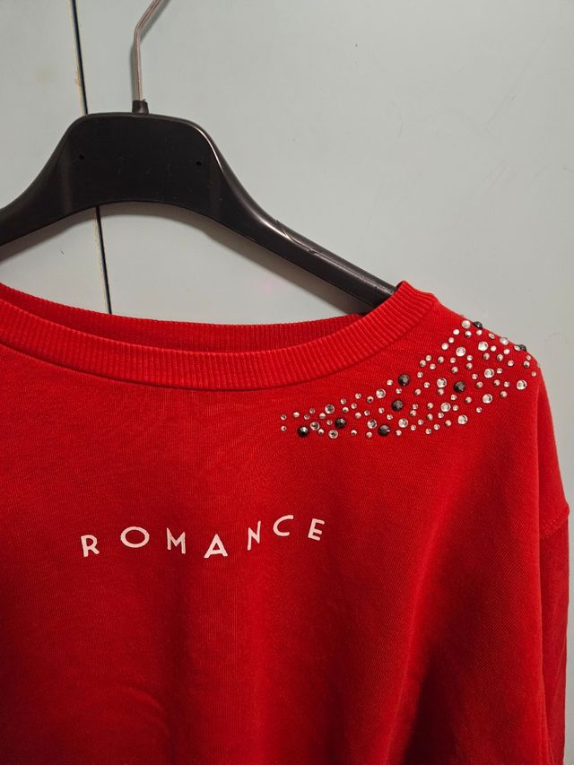 Felpa rossa con brillantini 