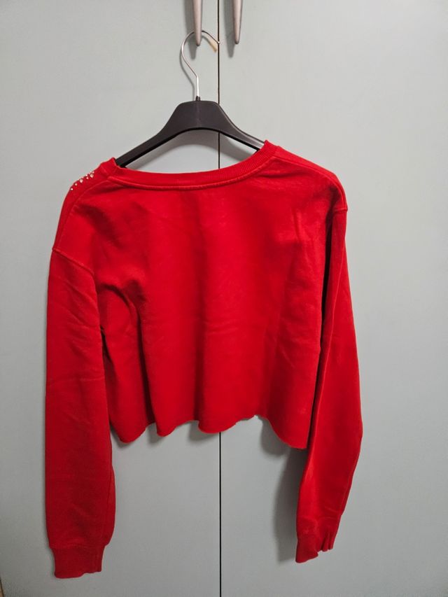 Felpa rossa con brillantini 
