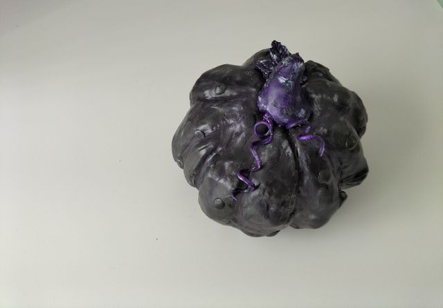 Calabaza negra y morada
