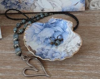 Conjunto colgador, marco y viera decorados