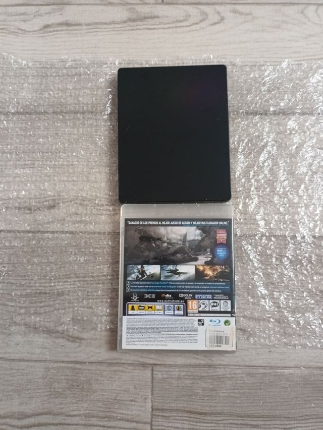 Juego PS3 Battlefield y steelbook. 