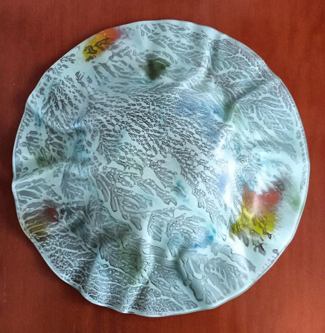 Piastra in vetro decorativa e funzionale