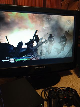 PlayStation 2 + 3 juegos