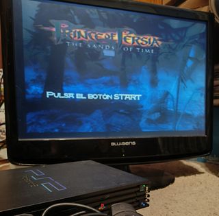 PlayStation 2 + 3 juegos