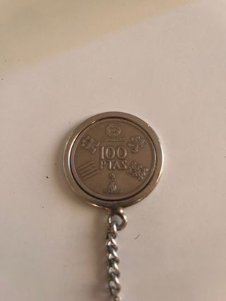 Llavero de moneda de 100 pesetas