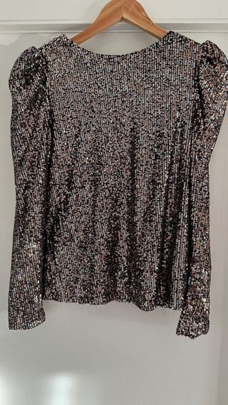 Camisa dorada y negra lentejuelas