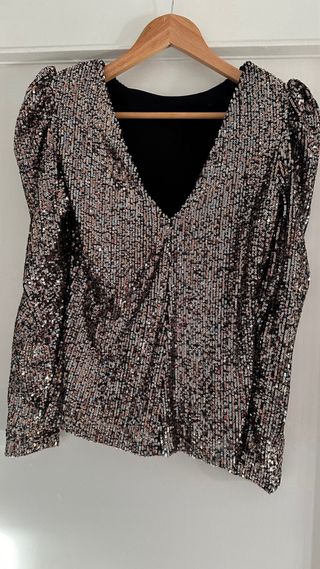 Camisa dorada y negra lentejuelas