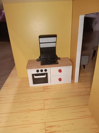 Casa muñecas de madera