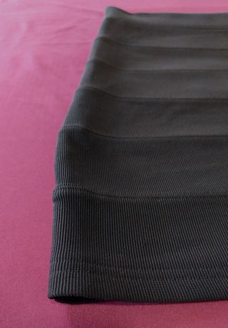 Minifalda negra ajustada elástica. T. M/L