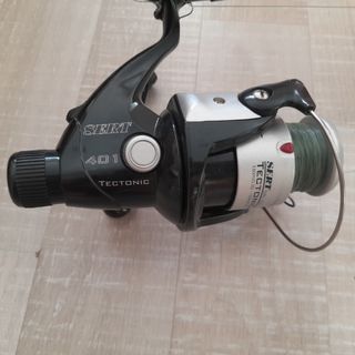 Caña de pescar con carrete sert