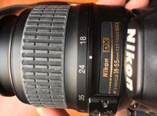 Camara Nikon D3100 con funda