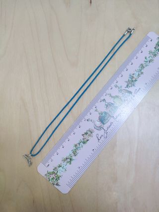 Collar de hilo y plata con colgante