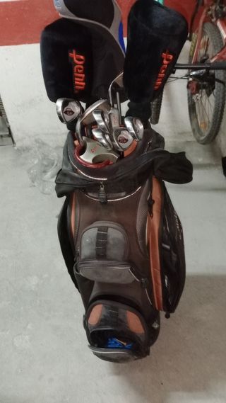 Bolsa y 14 palos de gof, pelotas, guantes...