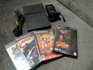 Ps2 slim con pack de 4 juegos