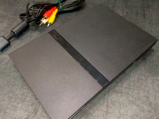 Ps2 slim con pack de 4 juegos