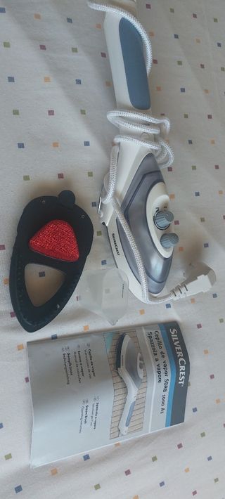 Cepillo plancha de vapor.a estrenar