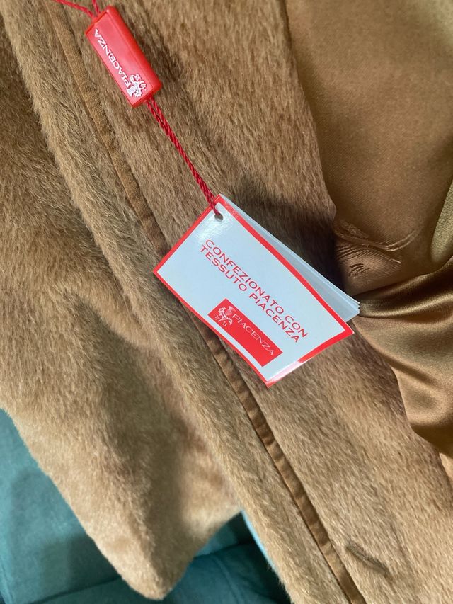 Un abrigo zorro  autentico