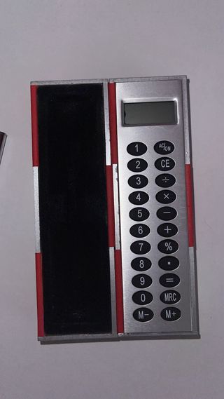 estuche calculadora y bolígrafo