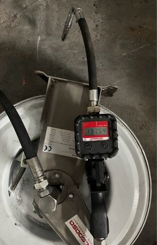 Errollador,bomba y pistola contadora aceite .