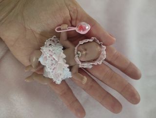 Mini bebé reborn silicona platino