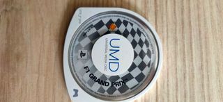 PSP consola,cargador, 7 juegos y  accesorios