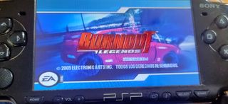 PSP consola,cargador, 7 juegos y  accesorios