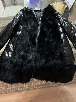 Parka muy abrigada , usada muy poco