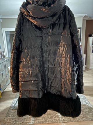 Parka muy abrigada , usada muy poco