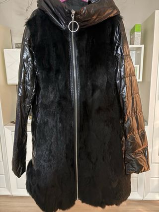 Parka muy abrigada , usada muy poco