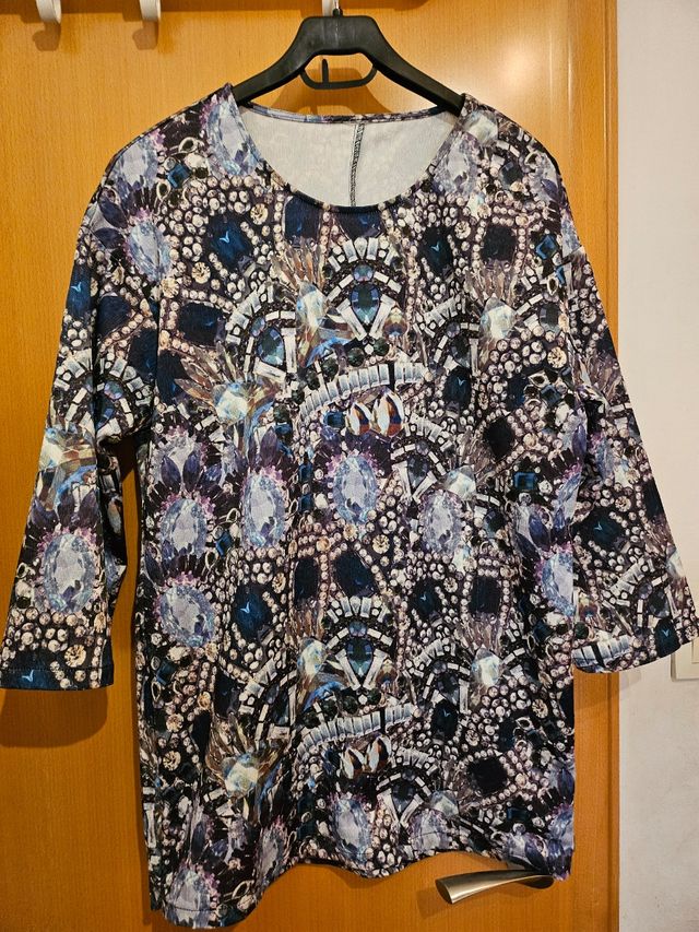 Blusa manga tres cuartos.