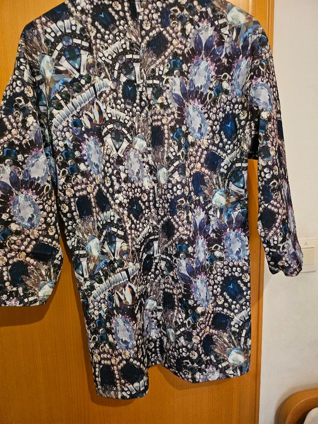 Blusa manga tres cuartos.