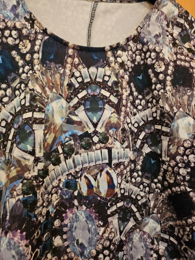 Blusa manga tres cuartos.