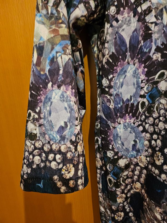 Blusa manga tres cuartos.