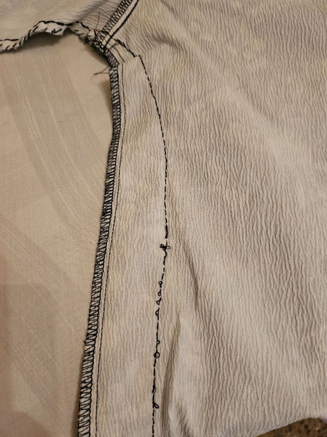 Blusa manga tres cuartos.