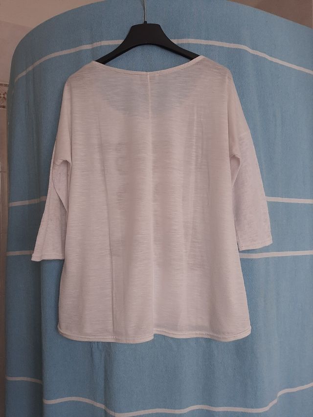 Maglia bianca con maniche a 3/4