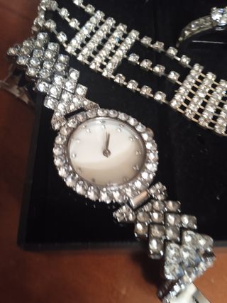 Reloj,pulsera y anillo.