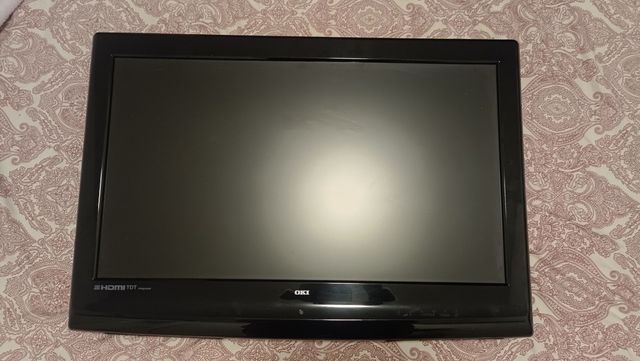 Televisión OKI + brazo extensible