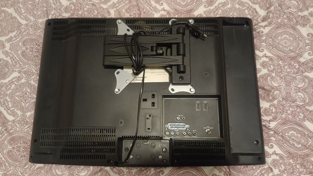 Televisión OKI + brazo extensible