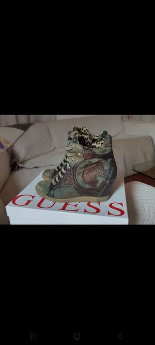 Guess branded sneakers with hidden heels