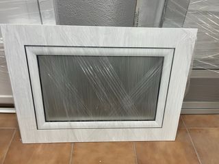Ventana de aluminio oscilobatiente