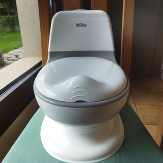 Orinal infantil Marca Nuby.