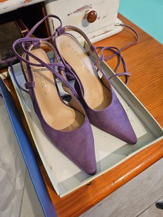 Zapatos abiertos por detras