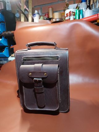 Bolsa costado cuero