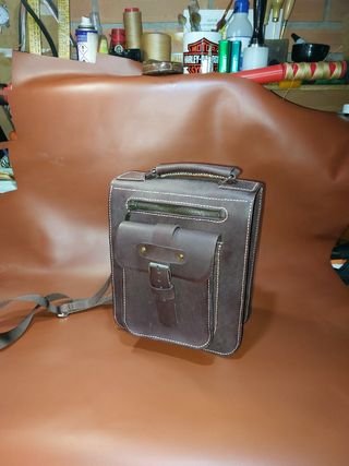 Bolsa costado cuero