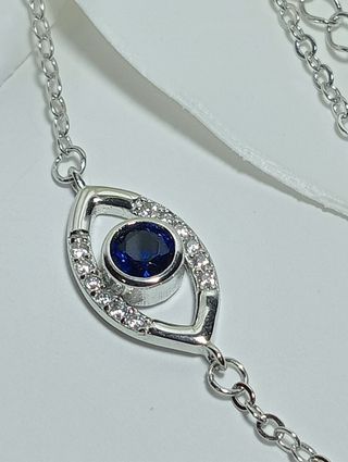 Bellísima pulsera ojo turco plata .